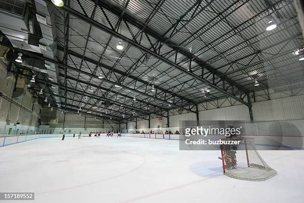 large modern interior hockey arena - goud metaal stock pictures, royalty-free photos & images
