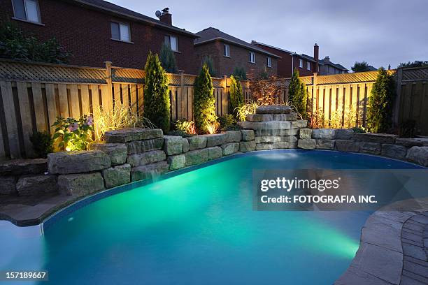 night pool - garden lighting stock pictures, royalty-free photos & images