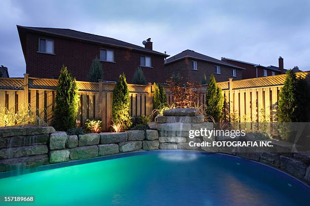 night at the pool - building feature stock pictures, royalty-free photos & images