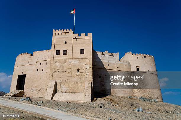 fujairah fortress united arab emirates - emirates palace stock pictures, royalty-free photos & images
