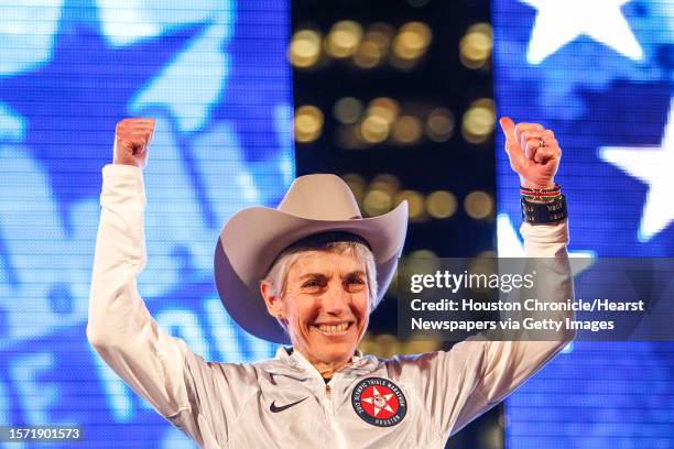 Olympic Marathon medalist Joan Benoit Samuelson reacts after receiving a cowboy hat during the U.S. Olympic Trials Marathon Opening Ceremony at...