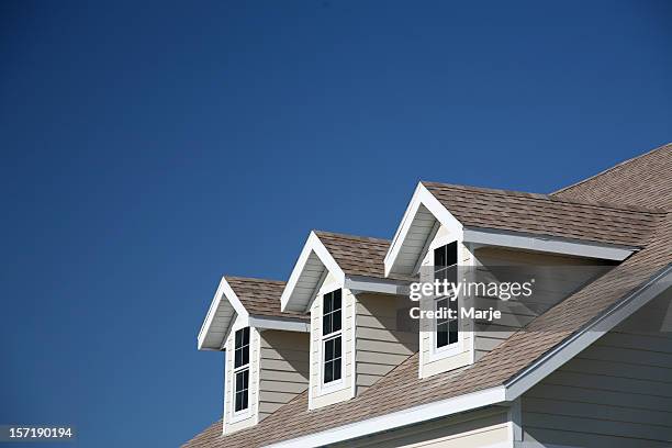 dormer windows - house roof materials stock pictures, royalty-free photos & images