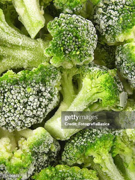frozen broccoli background - frozen vegetables stock pictures, royalty-free photos & images