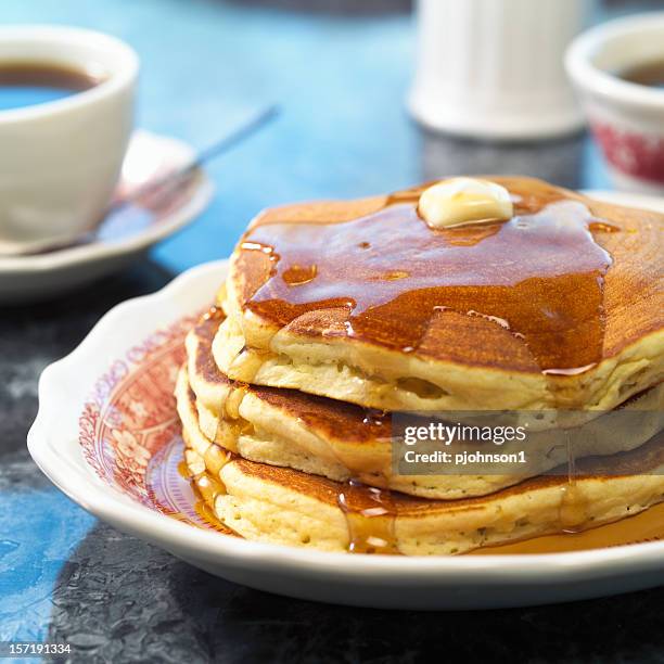 triple stack of pancakes and maple syrup and coffee - maple syrup pancakes stock pictures, royalty-free photos & images