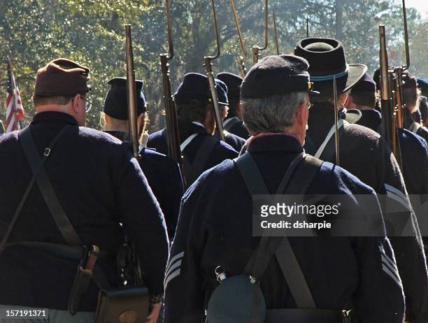 civil war reenactment - union troops marching - civil war stock pictures, royalty-free photos & images