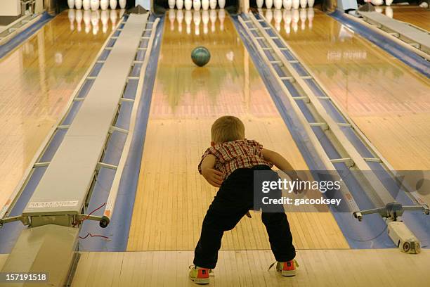 young boy bowling - bowling stock pictures, royalty-free photos & images