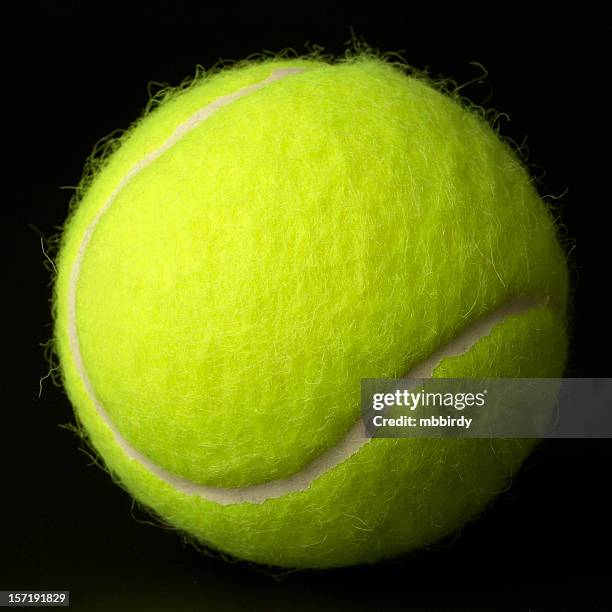 new tennis ball. - tennisbal stockfoto's en -beelden