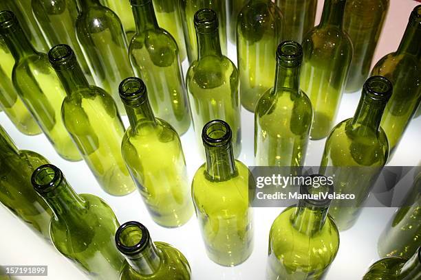 green bottles - bottling plant stock pictures, royalty-free photos & images