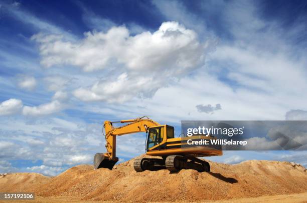 bulldozer - sand pile stock pictures, royalty-free photos & images