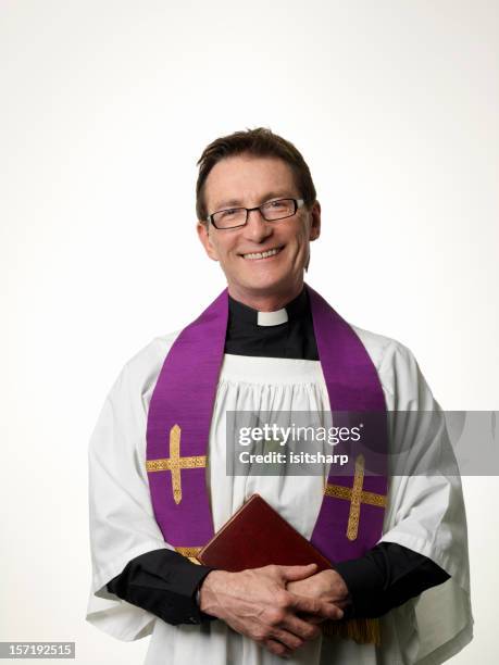 Smiling Priest High-Res Stock Photo