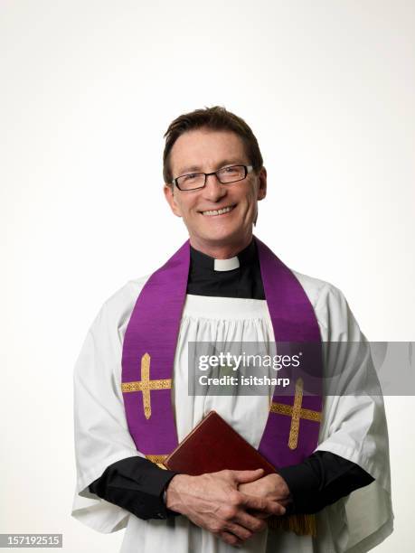 smiling priest - priest stock pictures, royalty-free photos & images