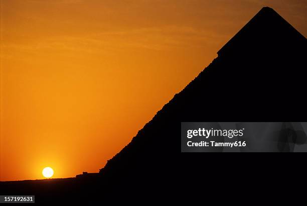 pyramids at sunset - great pyramids of egypt stock pictures, royalty-free photos & images