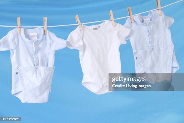 clothesline - triplet stock pictures, royalty-free photos & images