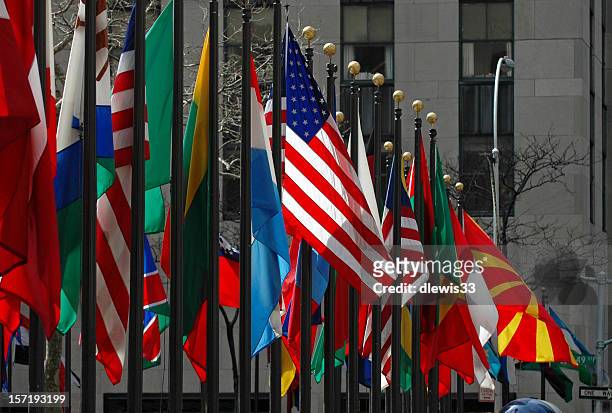 line of flags from all different countries and nations - diplomacy stock pictures, royalty-free photos & images
