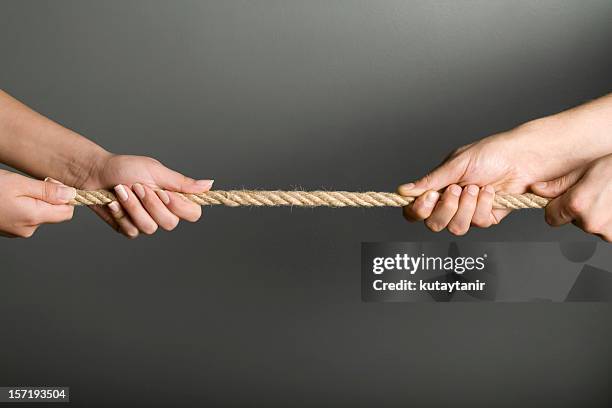 Two Hand Rope Pull Two Hands Pulling A Rope Photos and Premium High Res Pictures - Getty ...