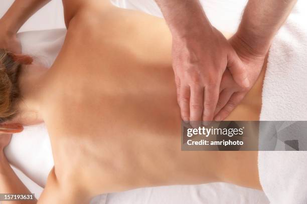 massage of the lower back - hernia recovery stock pictures, royalty-free photos & images