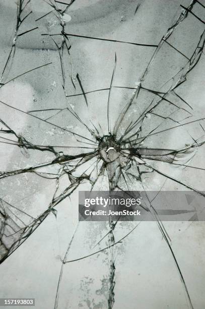 broken window - bullet hole stock pictures, royalty-free photos & images