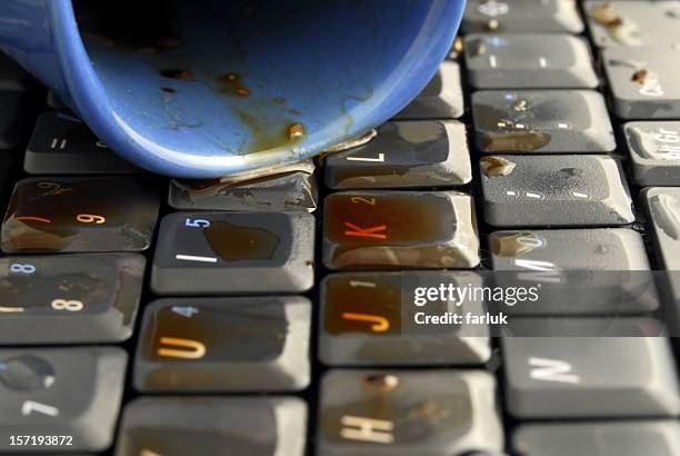 coffee keyboard 2 - coffee spill stock pictures, royalty-free photos & images