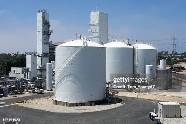 ariel view of a chemical refinery - storage tank stock pictures, royalty-free photos & images
