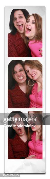 crazy kids in a photo booth - photo booth stockfoto's en -beelden