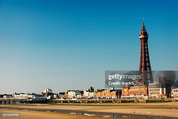blackpool tower. the promenade and the sandy beach, lancashire, uk - blackpool bildbanksfoton och bilder