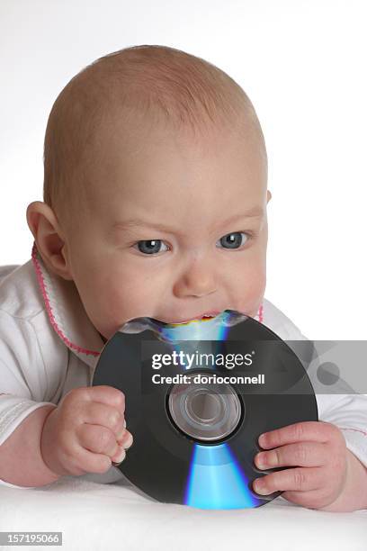 tastful musica di dj, baby - baby eating toy foto e immagini stock