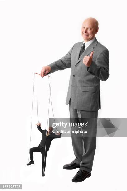 puppet on a string - puppeteer stock pictures, royalty-free photos & images