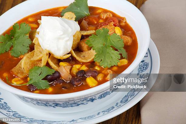 zesty chicken taco soup - black beans stock pictures, royalty-free photos & images