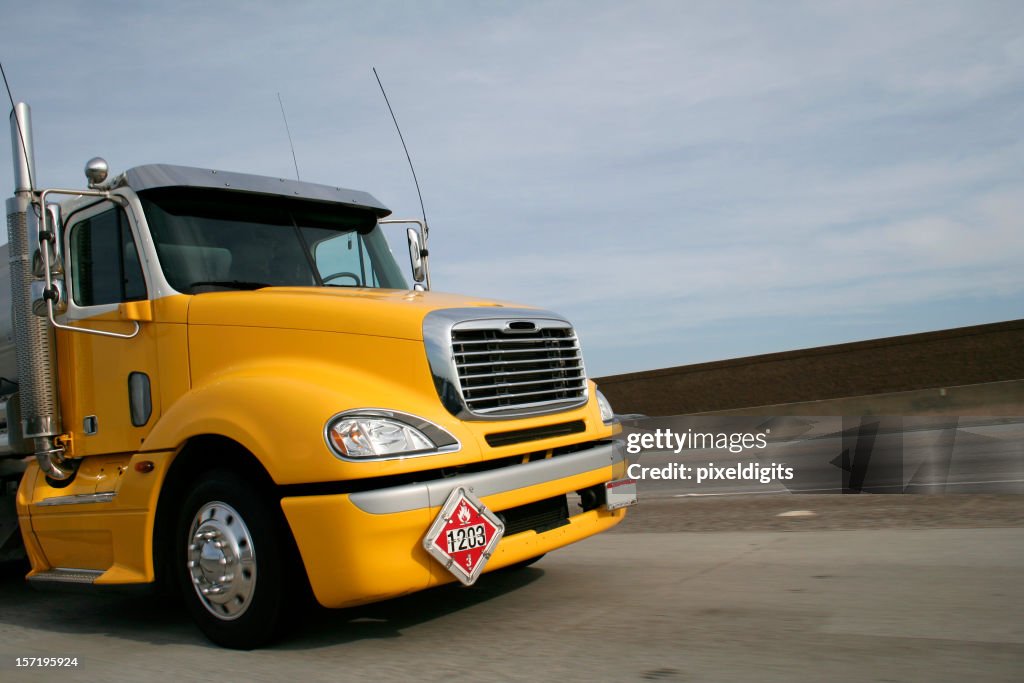 Yellow Gasoline Tanker Truck w/DOT 1203 sign