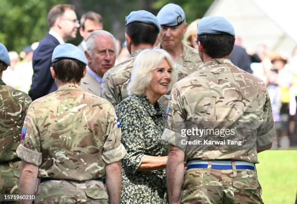 King Charles III and Queen Camilla during their visit to Sandringham Flower Show at Sandringham House on July 26, 2023 in King's Lynn, England.