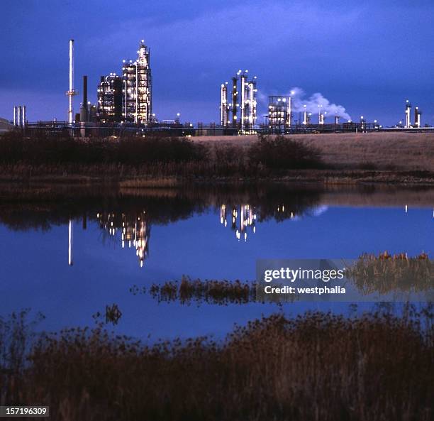 gas plant at dusk - swamp gas stock pictures, royalty-free photos & images