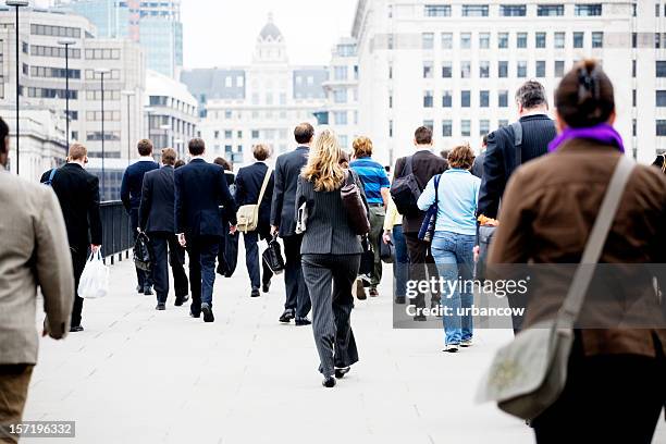 rush hour - business women london stock-fotos und bilder