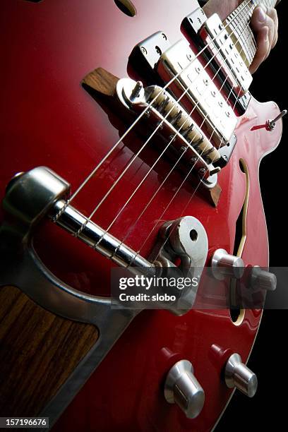 hollowbody electric guitar hollow body - red electric guitar stock pictures, royalty-free photos & images