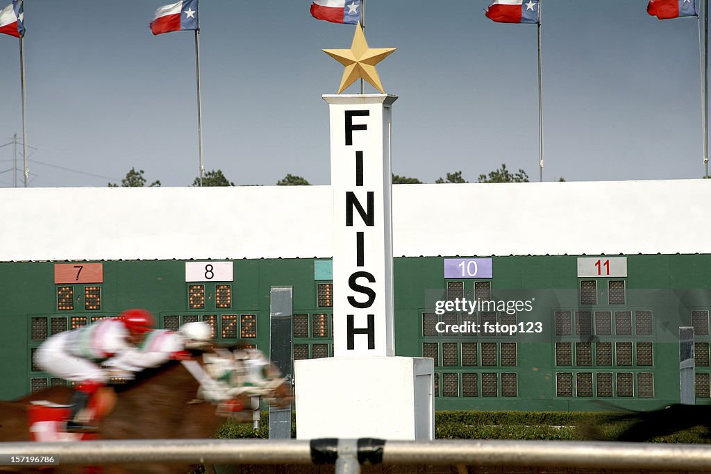 Horse racing. Race track finish line.