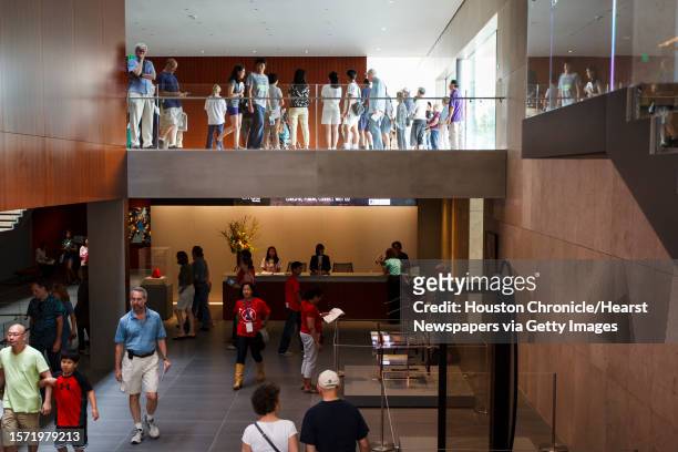 Visitors walk through the Asia Society Texas Center during the "First Look Festival", Sunday, April 15 in Houston. The Asia Society Texas Center...