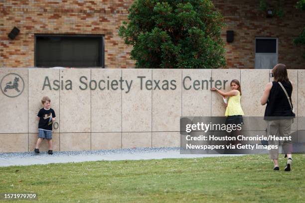 Visitors take a photo at the Asia Society Texas Center during the "First Look Festival", Sunday, April 15 in Houston. The Asia Society Texas Center...