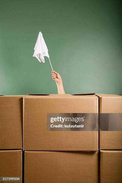 moving house - white flag stock-fotos und bilder