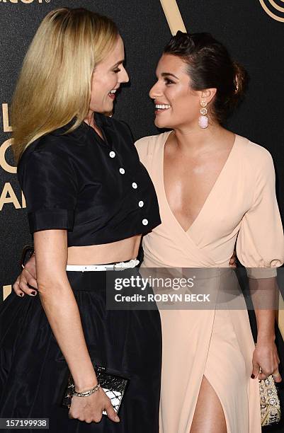 Actress Diane Kruger and Lea Michele greet each other as they arrive for the Hollywood Foreign Press Association and InStyle celebration of the 2013...