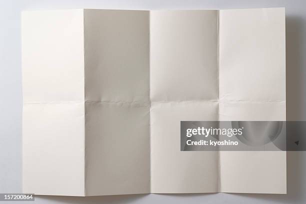 opened a folded paper on white background with shadow - ihopvikt bildbanksfoton och bilder