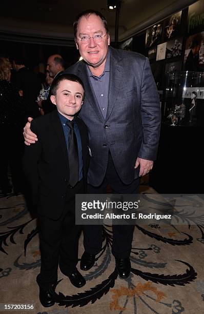 Actor Atticus Shaffer and chief creative officer of Walt Disney and Pixar Animation Studios John Lasseter attend Walt Disney Studios 2012 animation...