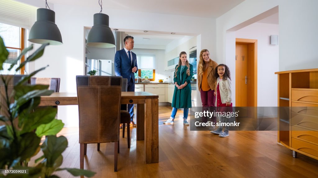 Estate agent showing house to women