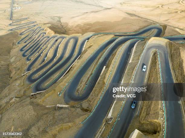 Aerial view of Panlong Ancient Road, with a total length of 75 kilometers and more than 600 hairpin turns, on July 21, 2023 in Taxkorgan Tajik...