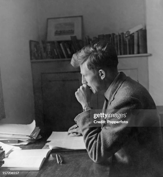 Twenty year-old English athlete Roger Bannister in a study at Exeter College Oxford, where he is a third year medical student, 23rd May 1949.