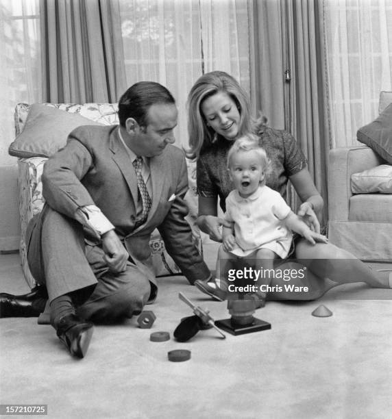 Australian media mogul Rupert Murdoch with his second wife Anna Maria Torv and their 14-month old daughter Elisabeth at their home in Sussex Gardens,...