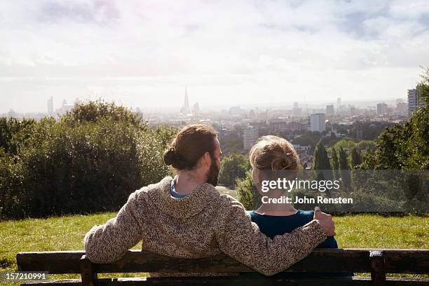 urban foraging for wild food berries and mushroom - couple london stockfoto's en -beelden