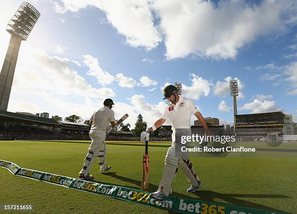 Ed Cowan of Australia walks from the ground after he was dismissed during day one of the Third Test Match between Australia and South Africa at the...