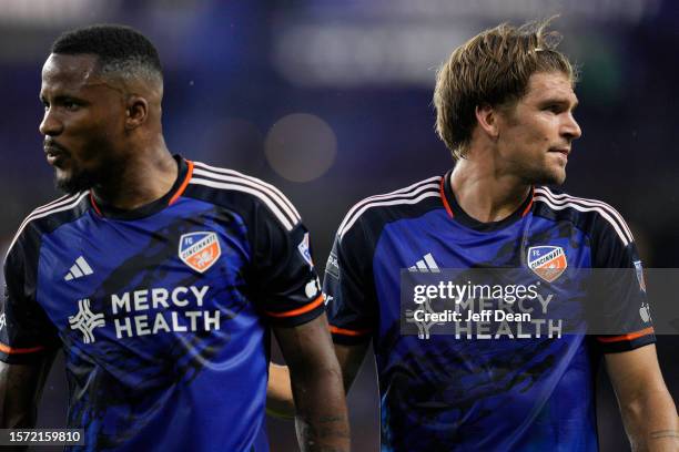 Alvas Powell and Nick Hagglund of FC Cincinnati play during the first half of a Leagues Cup match against Sporting Kansas City at TQL Stadium on July...