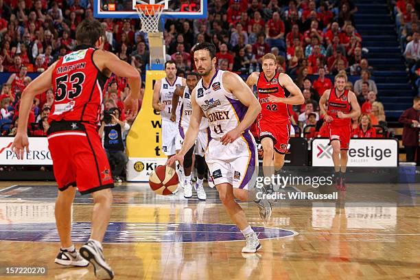 Aaron Bruce of the Kings brings the ball up court during the round nine NBL match between the Perth Wildcats and the Sydney Kings at Perth Arena on...