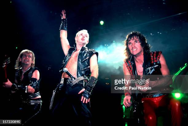 British heavy metal group Judas Priest perform onstage at the Rosemont Horizon, Rosemont, Illinois, June 14, 1984. Pictured are, from left, guitarist...