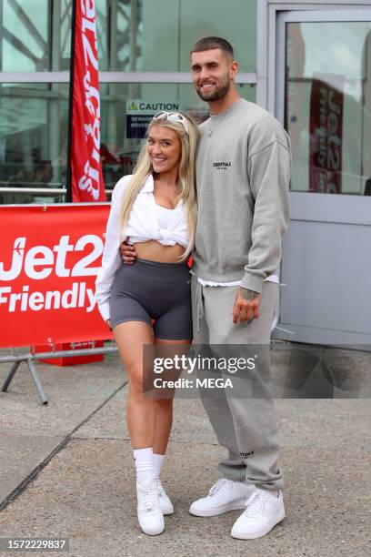 Molly Marsh and Zachariah Noble are seen arriving back in the UK on August 2, 2023 in London, United Kingdom.